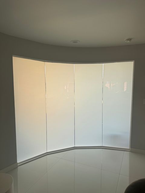 Same Malibu home window in frosted privacy mode for instant privacy during PCH traffic or beach-foot-traffic scenarios