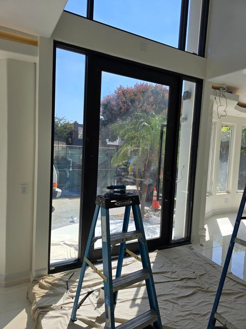 Switchable smart film install preparation showing proper glass-prep clean-room standards before application