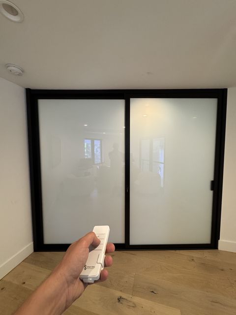 Smart glass home office walls in frosted privacy mode in Huntington Beach