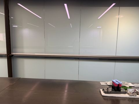 Frosted PDLC smart film office partitions in Los Angeles switched to privacy mode