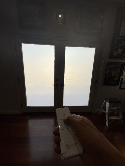Smart glass French doors Los Angeles after install — PDLC switchable panels replacing original living room glazing