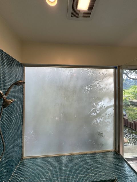 Smart film shower window in Tarzana CA home in opaque privacy mode