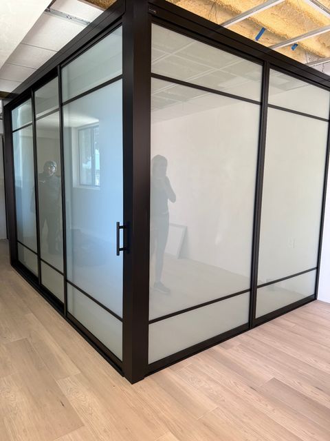 Same Silver Lake studio space in frosted mode showing privacy plus diffused daylight retention without going dark