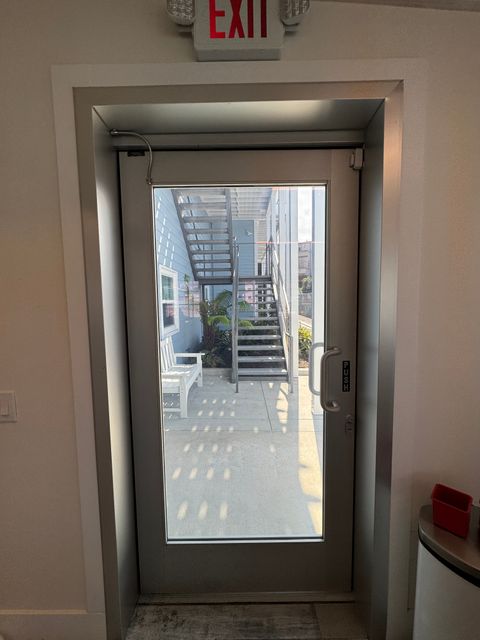 Frosted smart glass door in a Hermosa Beach home
