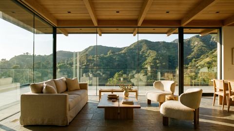 Glendale modern home with a floor-to-ceiling clear switchable smart glass wall overlooking the Verdugo foothills