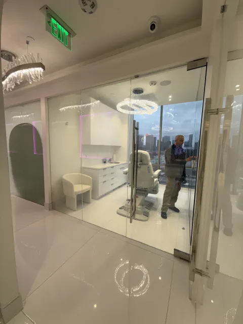 Real Smart View install at a Beverly Hills surgery clinic: switchable glass partition in the clear state, the treatment suite visible through the pane