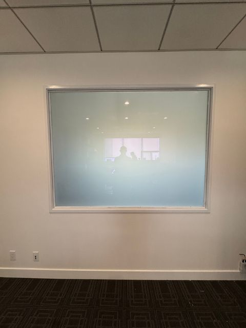 A large switchable picture window in a Los Angeles home frosted to opaque privacy