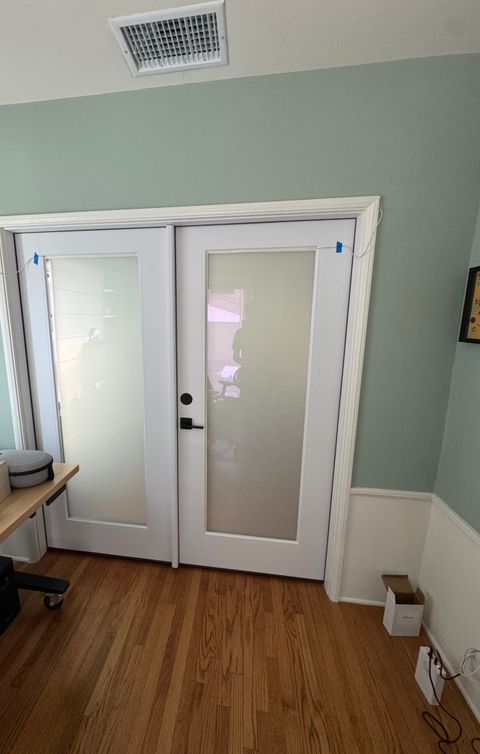 Burbank home office French doors with the smart glass switched to frosted, both panes an even milky white