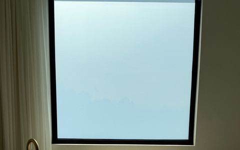 Switchable smart glass window in frosted mode in a Hidden Hills master bathroom — 185 sqft PDLC retrofit by Smart View