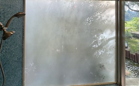 Smart film shower window in Tarzana CA home in opaque privacy mode