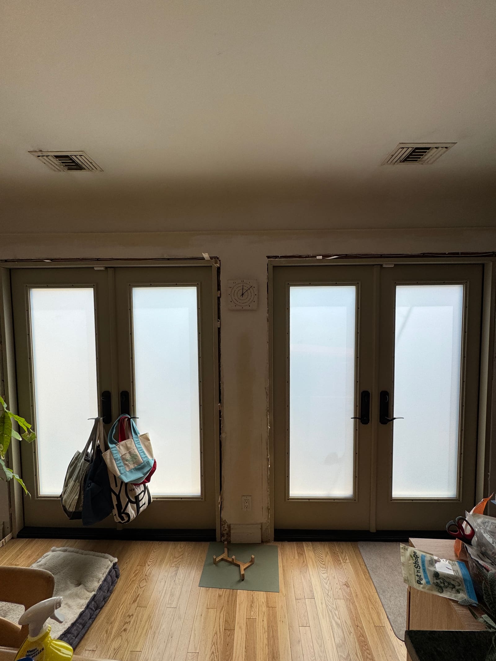 Switchable french doors in frosted privacy mode in a Los Angeles residence