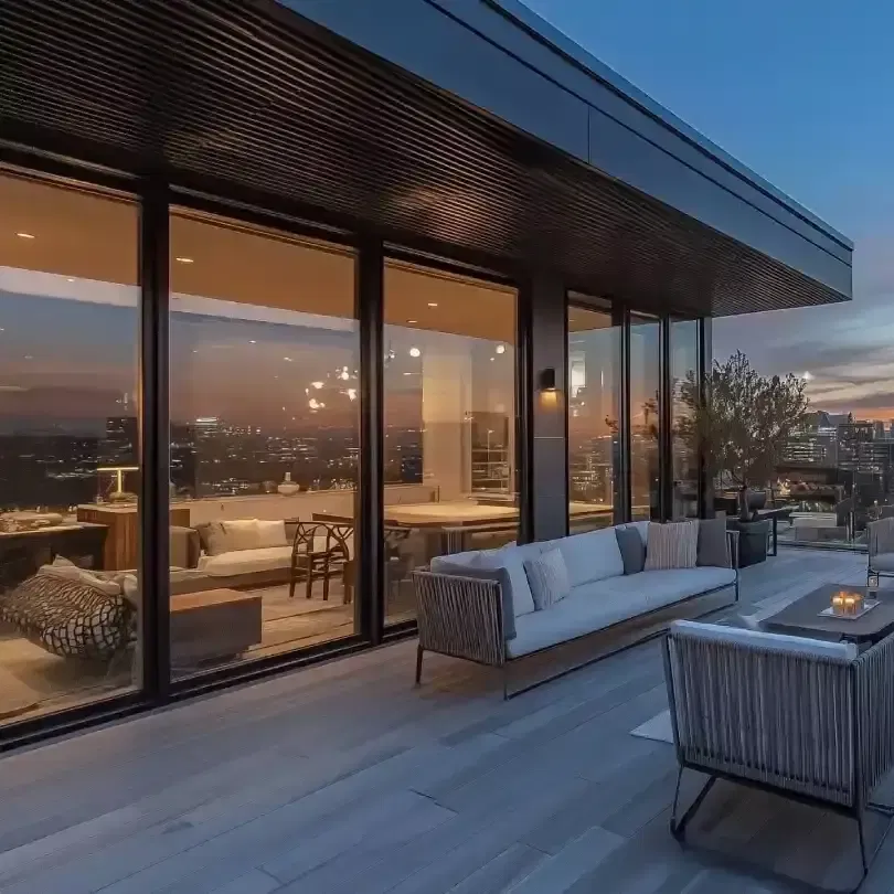 Smart glass automation mistakes addressed — modern high-rise residence with floor-to-ceiling glass panels retrofitted with Smart View PDLC and integrated smart-home controls