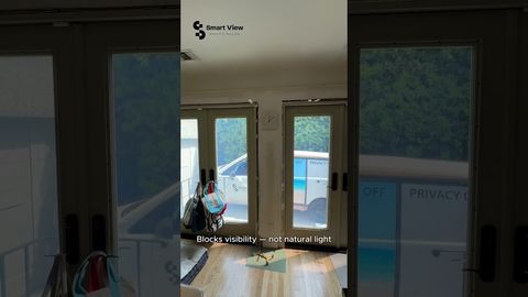 Huntington Beach glazed entry doors with smart film switching to frosted privacy